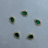 Emerald charms